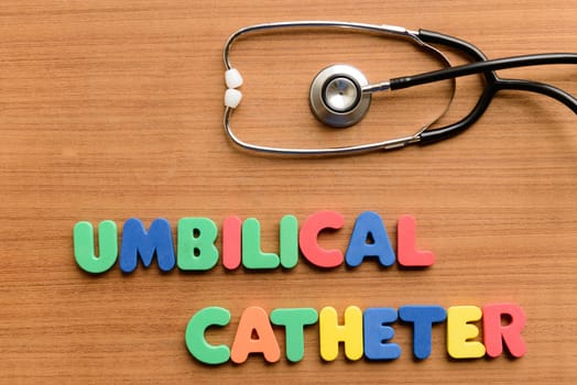 Umbilical catheter colorful word on the wooden background