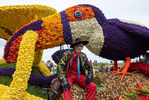 Noordwijk, Netherlands - April 22, 2023: Spectacular flower covered floats in the Bloemencorso Bollenstreek the annual spring flower parade from Noordwijk to Haarlem in the Netherlands.
