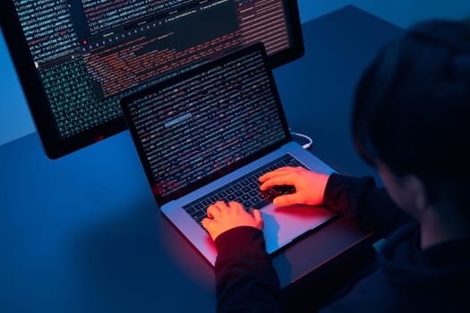 Man using computer and programming  to break code. Cyber security threat. Internet and network security. Stealing private information. Person using technology to steal password and private data. Cyber attack crime