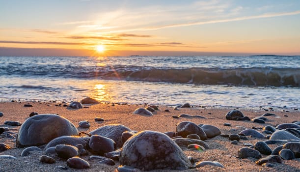orange, sunset between rocks in the sea of the Baltic Sea near Dranske on the island of Rügen-	Beautiful sunset over the sea with waves and rocks in the foreground