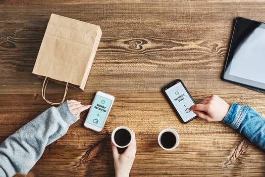 Money transfer. Online banking. People transferring money online using applications for send and receive money on smartphones. Friends making money transfers. Smartphone screen displaying money transfer confirmation. Digital wallet. Money exchange. Paying for online shopping. Fast payment system