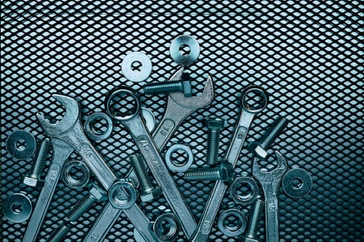 Set of chrome wrenches on steel surface. Mechanic tools for maintenance. Hardware tools to fix. Technical tools background