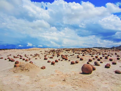 Cancha de Bochas, rocks shaped as balls that formed by adherence in a river-Ischigualasto Provincial Park, Argentina