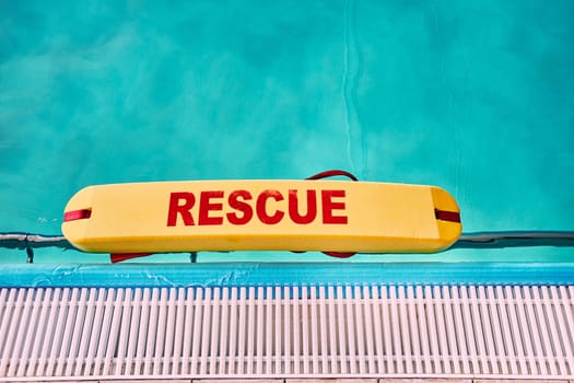 Lifesaver equipment on swimming pool. Candid people, real moments, authentic situations
