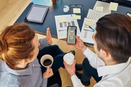 Business colleagues having video call discussing financial data working together in office. People entrepreneurs working with charts and tables on computer. Team working together. Workmates talking about project