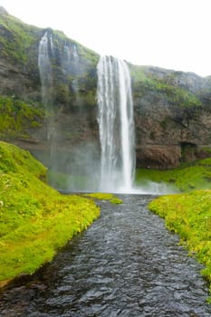 Seljalandsfoss falls in summer season view, Iceland. Icelandic landscape.