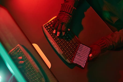 Anonymous people using computer and programming to break code. Cyber security threat. Internet and network security. Access to private information. Anonymous hackers using technology to access to password and encrypted data. Cyber attack