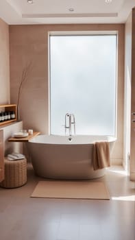 Scandinavian style bathroom interior in light colors. The bathtub is located near the window. High quality photo