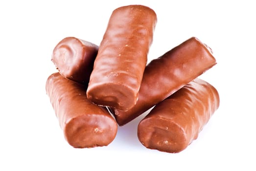 Chocolate rolls isolated over white background