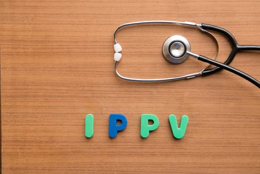 Intermittent positive pressure ventilation (IPPV) colorful word with stethoscope on the wooden background