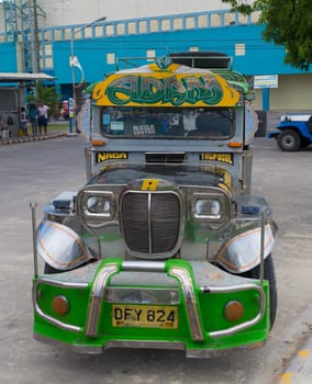 jeepneys in the streets of naga city. Jeepneys are the most popular means of public transportation in the Philippines.