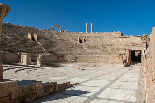 Archaeological site of Leptis Magna, Libya - 10/30/2006: The Ruins of the ancient theater in the ancient Roman city of Leptis Magna.