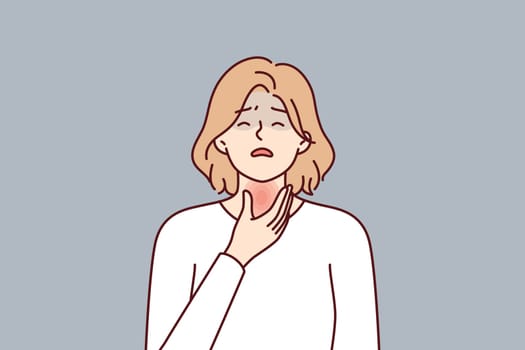 Woman is experiencing thyroid pain associated with hypothyroidism or cancer of endocrine system and puts hand on red neck. Thyroid disease requiring treatment and therapy or surgery