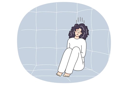 Unhappy sick woman in straitjacket sit on floor in psychiatric clinic suffer from mental disorder. Upset ill female patient or madhouse struggle with psychiatric issues. Vector illustration.