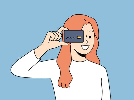 Smiling woman holding plastic credit card in hands. Happy female user with bank card enjoy effortless contactless payment. Vector illustration.