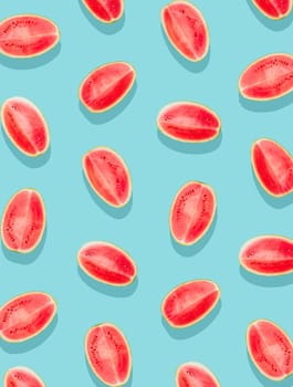 Watermelon pattern. Slices of watermelon on a plain surface painted in bright blue