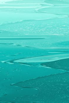 Abstract green color waves. Vertically.