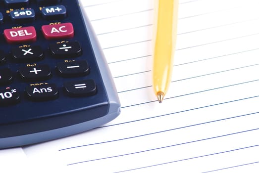 Calculator with notebook and pen
