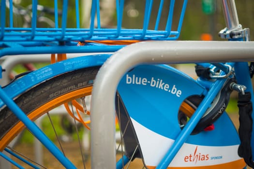 Kalmthout, Belgium, May 2023: Illustrative Editorial: Closeup shot of blue-bike bike sharing and rental