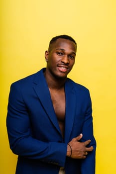 African American millennial businessman isolated on a studio background, successful male formal suit