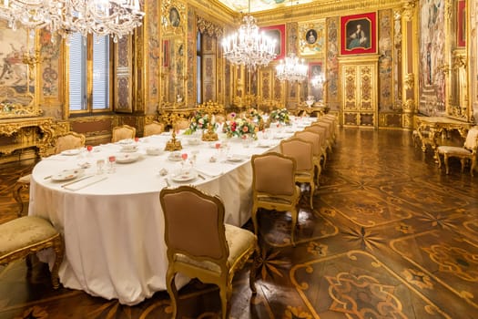 Turin, Italy - April, 2023: Royal Palace Dining Room. Luxury elegant ancient interior, circa 1860