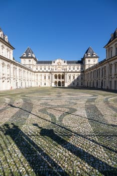Turin, Italy - February 2023: castle exterior. Historical landmark with blue sky and daylight