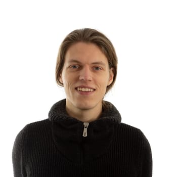 Portrait of young man with long hair on white background