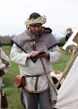 Krakow, Poland - April 11, 2023: Unidentified participants of Rekawka - Polish tradition, celebrated in Krakow on Tuesday after Easter. Currently has the character of festival historical reconstruction