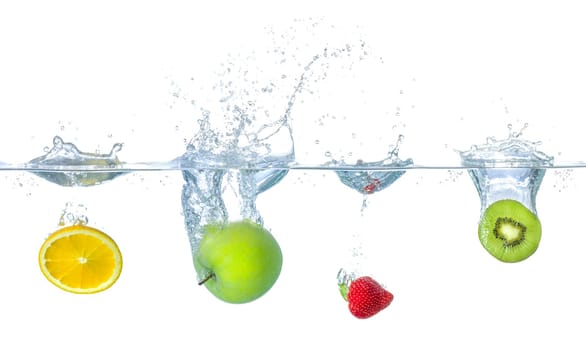 Various fruits fall into the water with splashes
