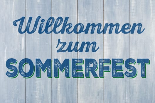 Wooden wall with the inscription Welcome to the summer festival