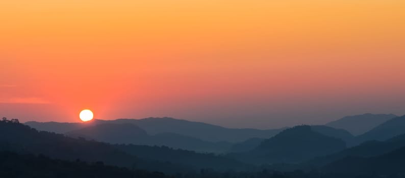 Stunning view of sunset over mountains in Thailand
