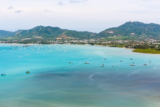 High angle view pier for travel boat at Ao Chalong bay in Phuket Island is a tourist town by the sea from Khao-Khad mountain viewpoint famous attractions of Thailand