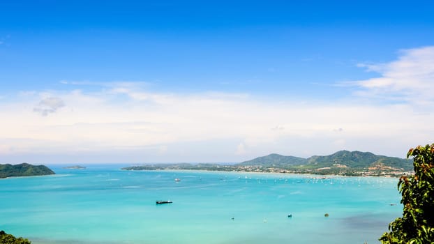 High angle view blue sky over the Andaman Sea and seaside tourist town from Khao-Khad mountain viewpoint famous attractions in Phuket island, Thailand, 16