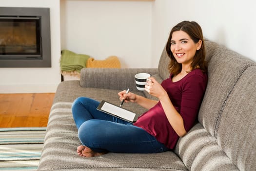 Beautiful woman at home Having a good time with cup a coffee