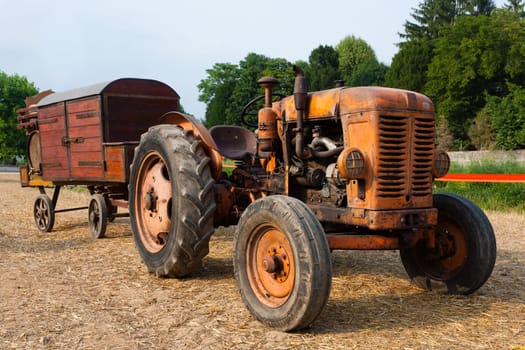 Old tractor with farm wagon, agriculture, rural life