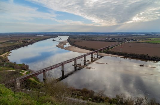 Santarem, Portugal. Ponte Dom Luis I Bridge, Tagus River and Leziria fields the fertile alluvial plain of Ribatejo. Seen from Portas do Sol viewpoint