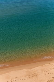 Turquoise water on the uncrowded beaches of Sagres in Algarve, Portugal