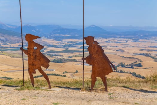 Alto del Perdon, Navarre, Spain: 22 August 2022: Wrought iron pilgrims monument erected by the Friends of the Way of Navarre in 1996 on the Mount of Forgiveness
