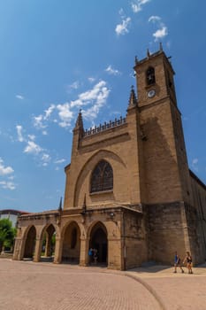 Navarre, Spain, 26 August, 2022: People at the Church of the town of Obanos in Navarre Spain
