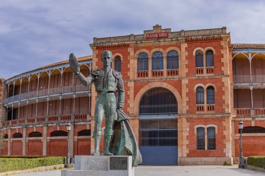 Salamanca, Spain: 23 March 2023: Statue in front of the bullfighting arena (Plaza de Toros), Salamanca, Castile and León region, Spain