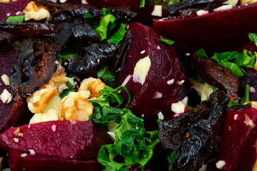 Diet salad of boiled beets, nuts and goat cheese on the plate. Flat lay.