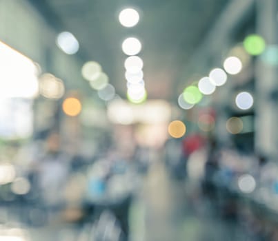 Abstract blur image of cafe with colorful bokeh for background. Vintage color effect tone