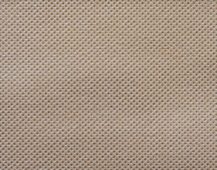 Light brown texture background of nonwoven or spunbond fabric