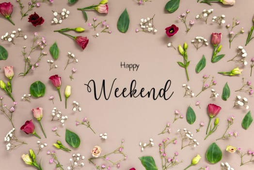 Flower Arrangement With English Text Happy Weekend. Colorful Spring Blossoms And Flowers Like Roses Building A Frame. Flat Lay With Brown Paper Background
