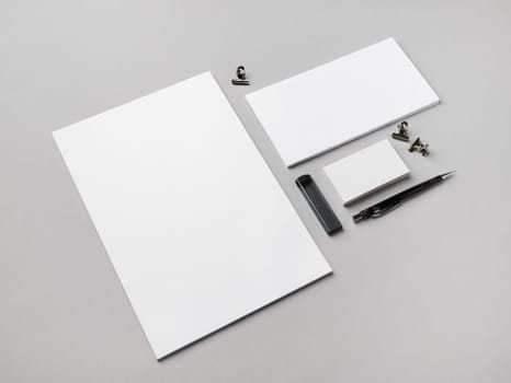 Blank branding stationery set on gray paper background. Responsive design template.