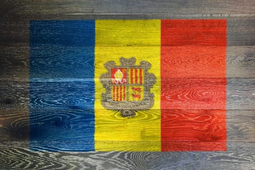 An Andorra flag on rustic old wood surface background