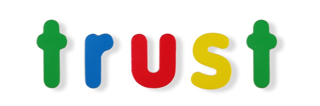 trust word coloured magnetic letters on white with clipping path to remove shadow