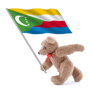 A Comoros flag being carried by a cute teddy bear