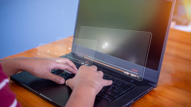 Person watching online movie or TV series on laptop computer screen. streaming online, watching video on internet, live concert, show or tutorial. Concept of live digital stream.
