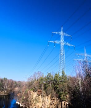 power poles at a lake in a Stone pit, local recreation area